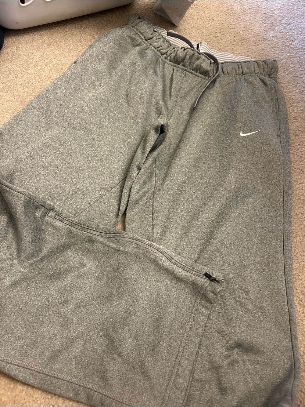 Nike women’s Gray Athletic Sweatpants with Zip Bottom